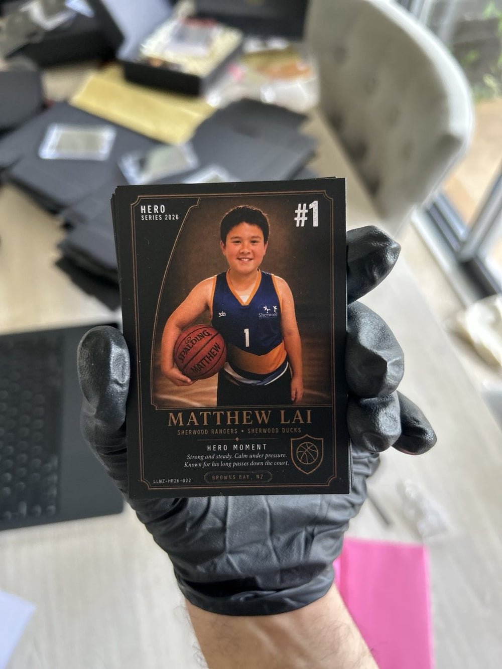 Real printed Matthew Lai basketball card photographed after production